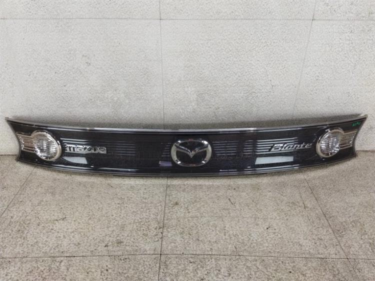 Вставка между стопов Mazda Biante